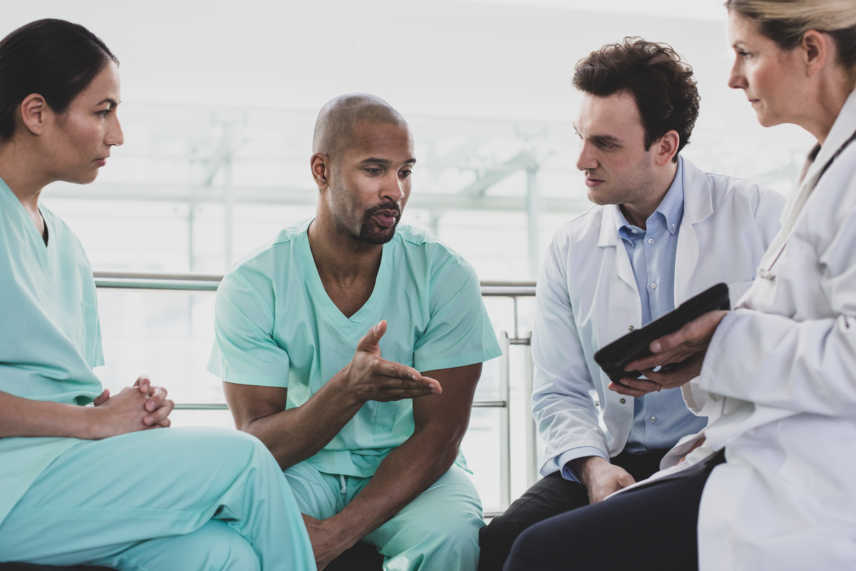 Healthcare professionals discussing fertility care
